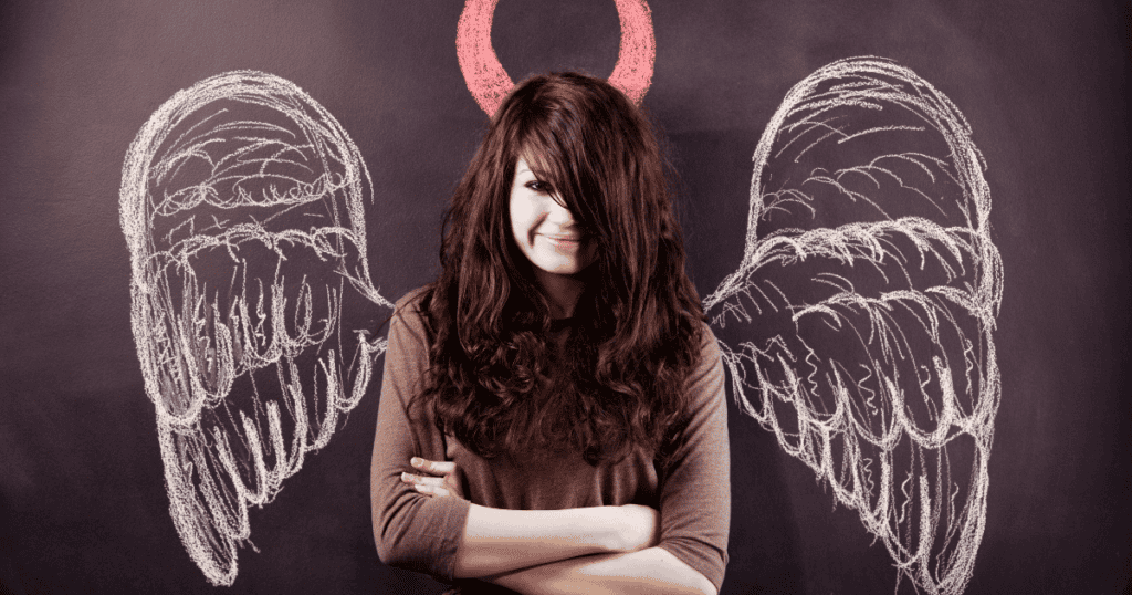 Girl with angel wings and devil horns